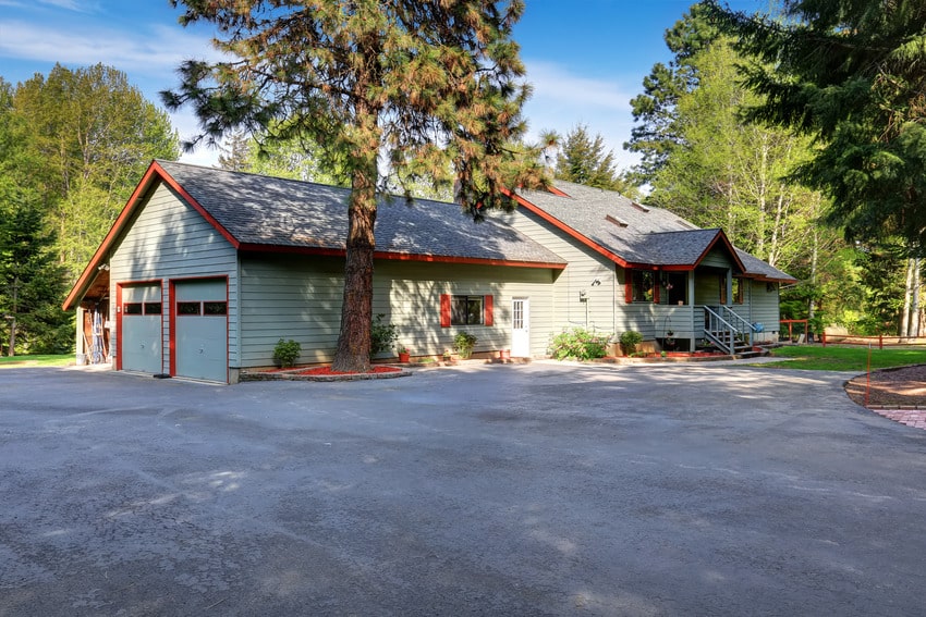 American country house exterior with wide asphalt driveway