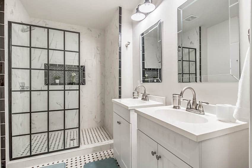 Bathroom shower with ceramic mosaic tile floors french glass style enclosure quartz walls