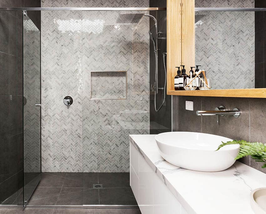 Bathroom shower with soapstone tile floors