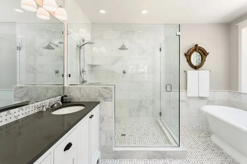 beautiful bathroom with shower bathtub and sink with high end furnishings and tempered glass shower stall