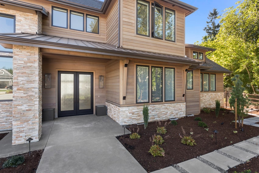 Beautiful large luxury home with cypress siding exterior