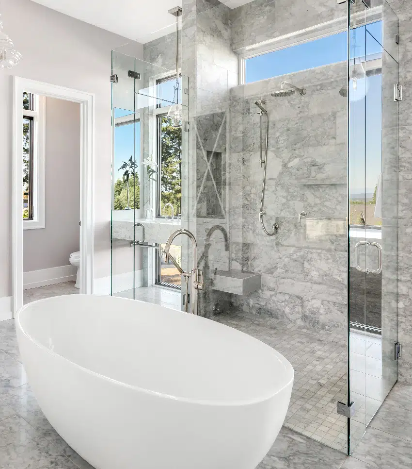 https://designingidea.com/wp-content/uploads/2021/07/beautiful-marble-tiled-bathroom-with-corner-shower-bench.jpg.webp