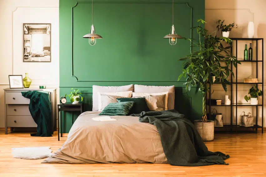 Bedroom with green wall blanket and minimalist shelf