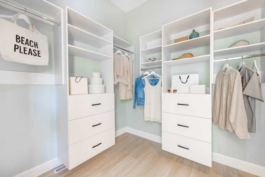 Closet wood look floor and light blue walls