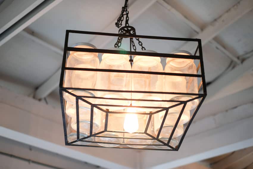 Customized mason jar light hanging from ceiling