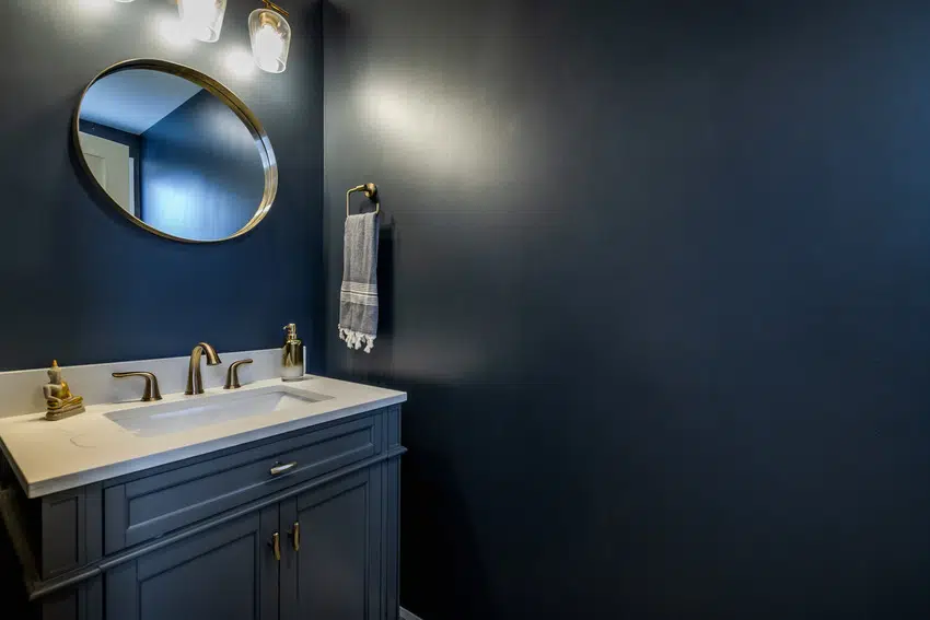 Dark bathroom interior with high gloss finish
