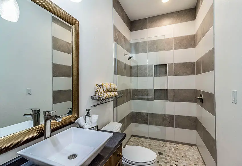 Guest bathroom with shower and mosaic porcelain tile floors
