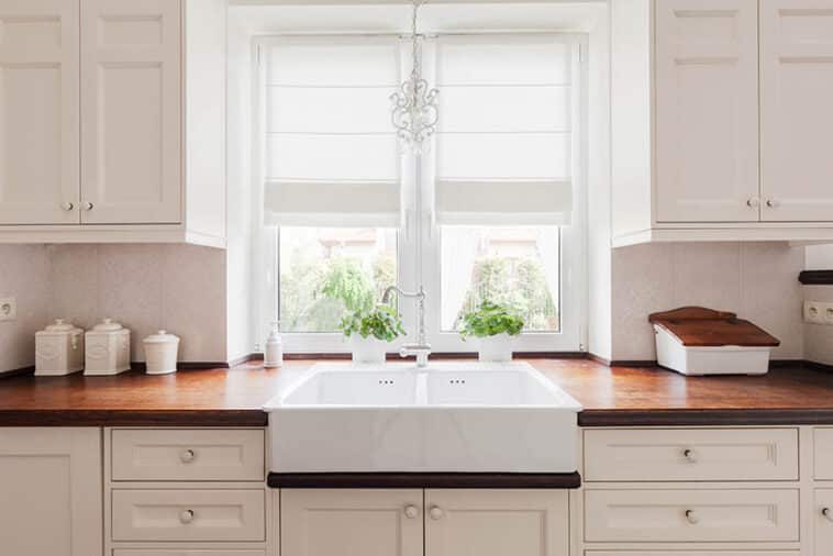 Are Wood Countertops Worth It Explore Their Pros And Cons   Kitchen With Wood Countertops White Cabinetry Farmhouse Sink Is 758x506 