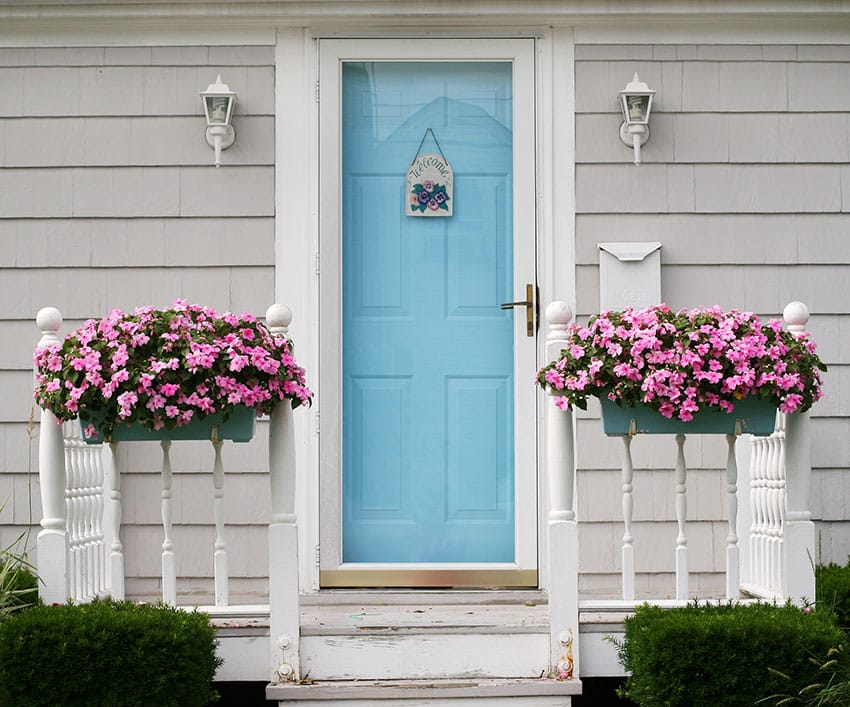 Light blue door gray house