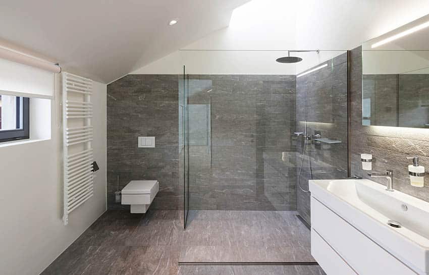 Modern attic bathroom shower with soapstone tile floors