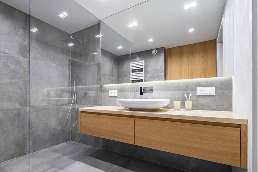 Modern bathroom with concrete surfaces in shower