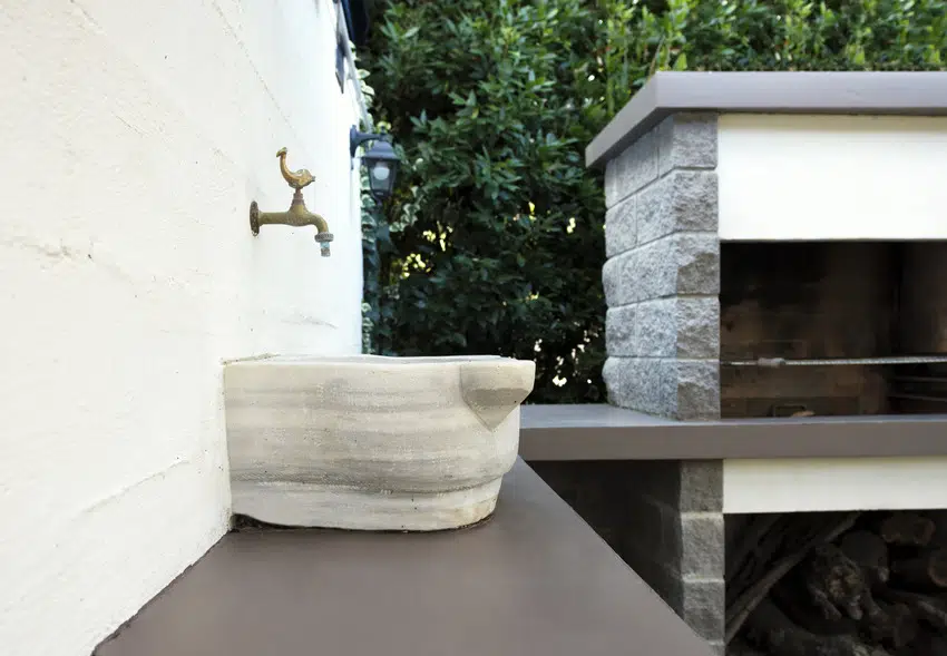 Modern outdoor kitchen covering with resin