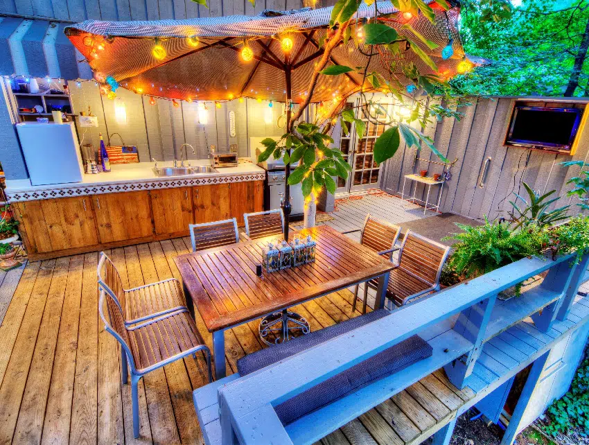 Wood deck with string lights furniture at a home in the woods
