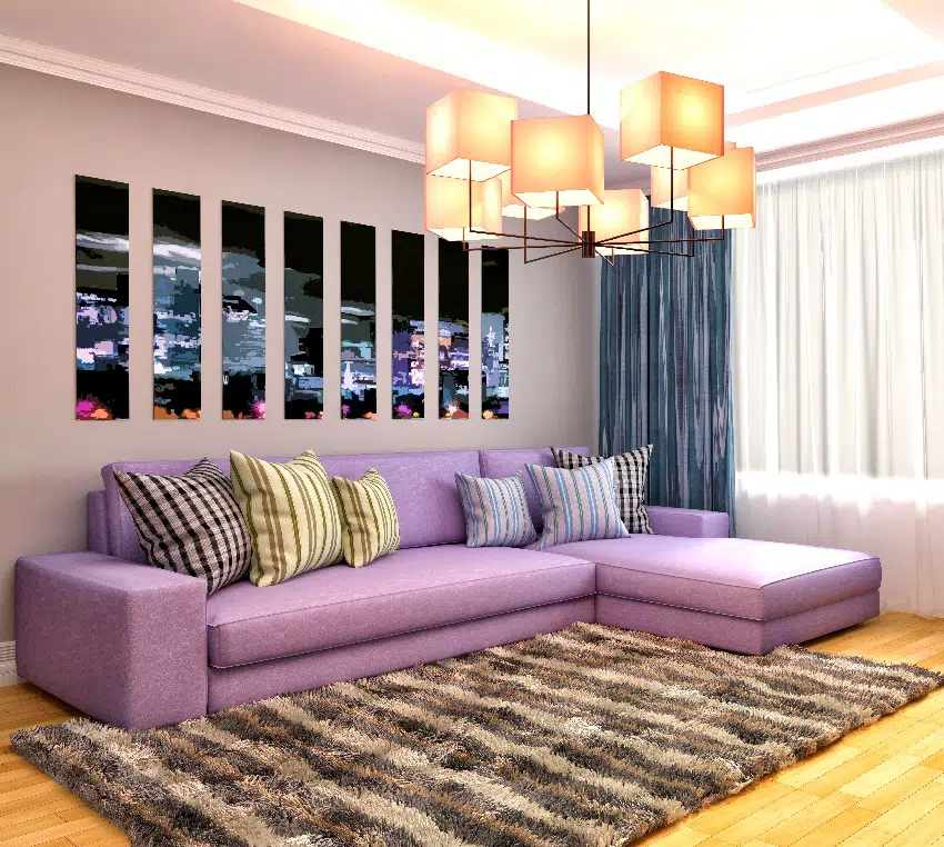 Old rose wall with purrple sofa and brown stripes carpet
