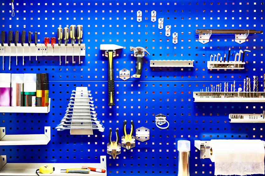 Pegboard with hanging tools