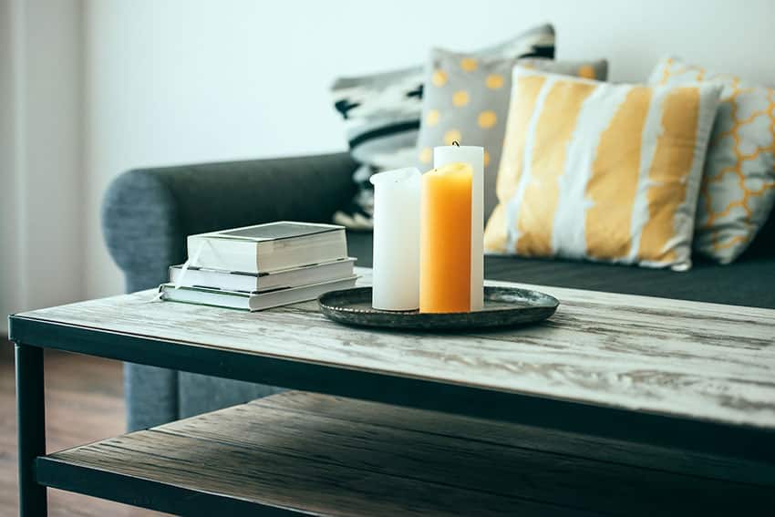 Rustic coffee table with candles and books