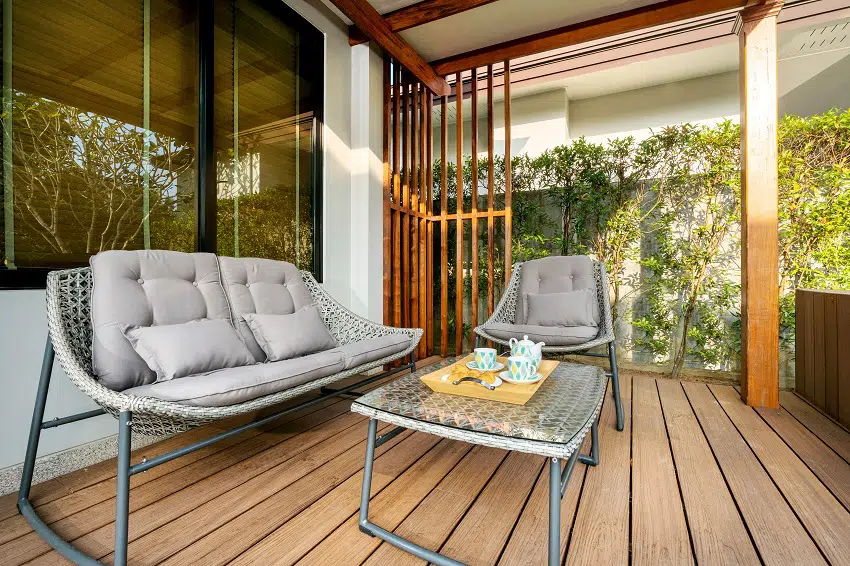veranda with wooden composite decking and furniture