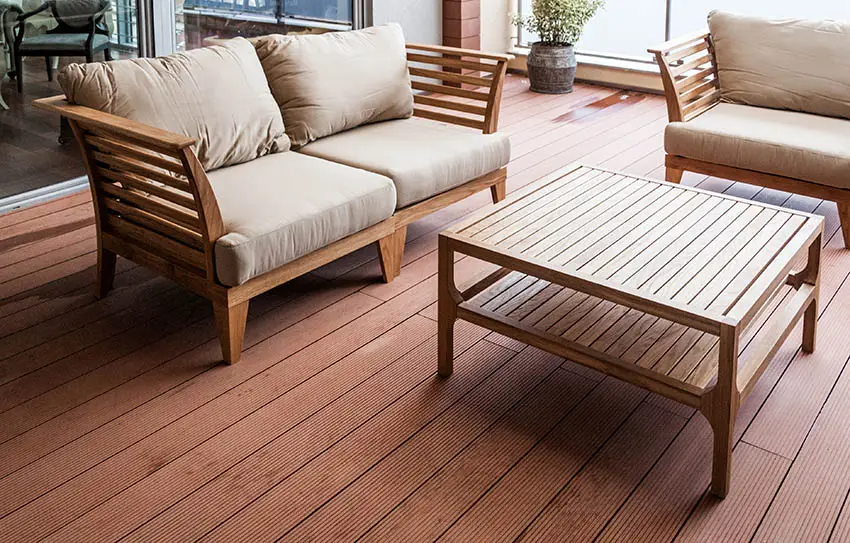 Wood outdoor furniture with cushions on deck