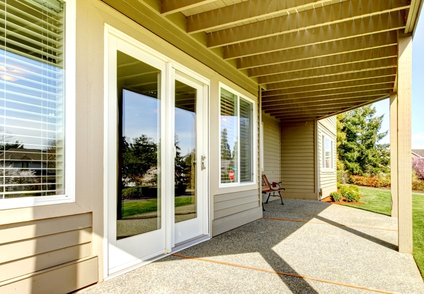 Backyard walkout deck with concrete floor 