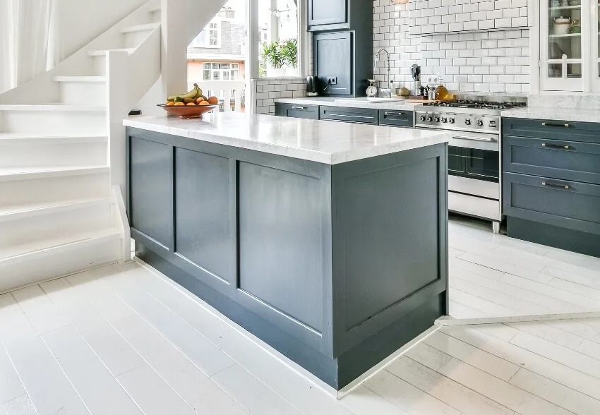 Beautiful kitchen interior design with dark gray board and batten island trim