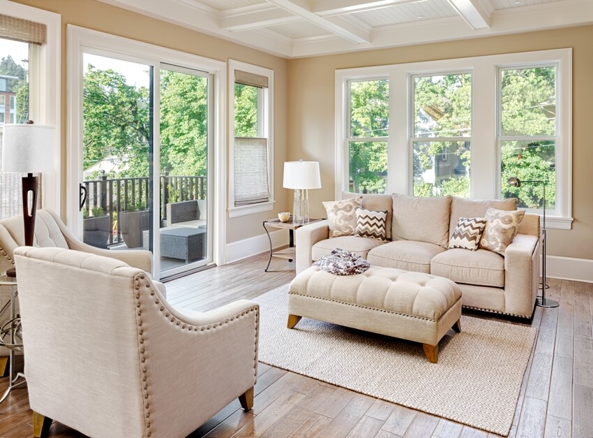 Beautiful living room with furniture hardwood floors and beige carpet