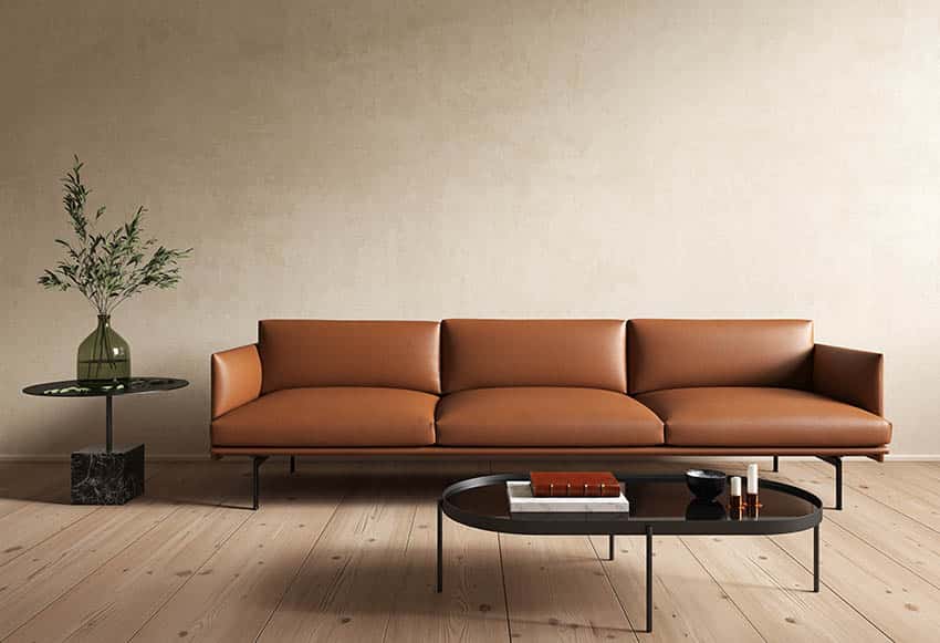 Beige wall living room with burnt orange couch