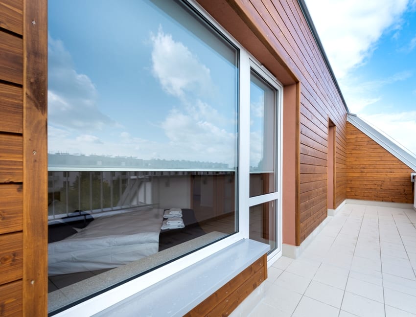 Big window balcony with siding