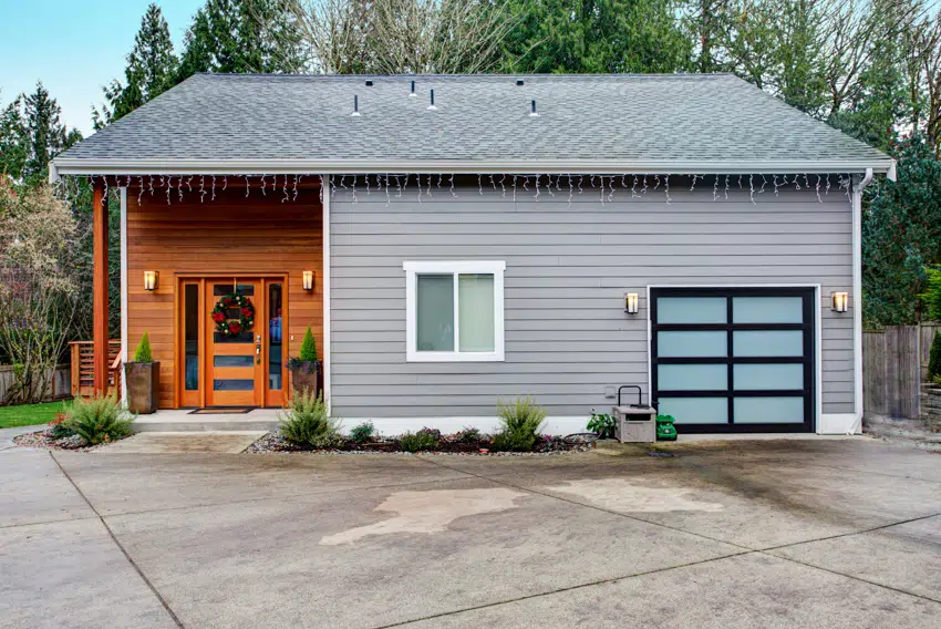 Classic house with gray wall and fiber cement siding