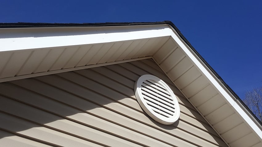closeup of a roof vent on a house attic