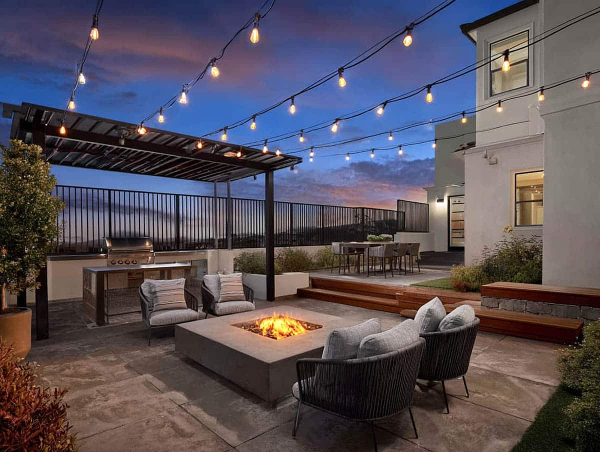 Firepit with lights on a string overhead
