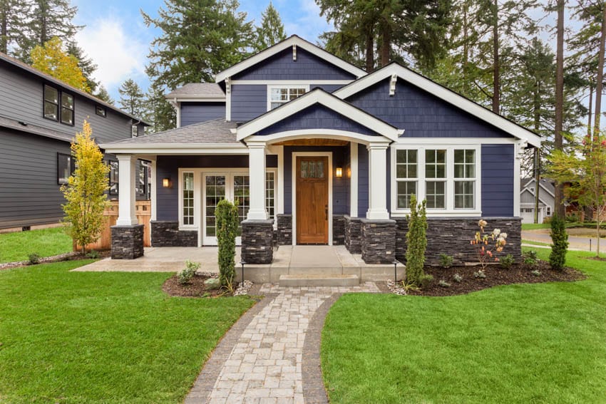 Dark blue color house with classic door