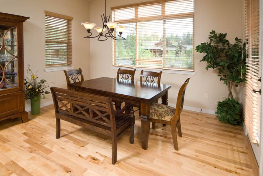 Dining table with hickory wood floor chairs and bench