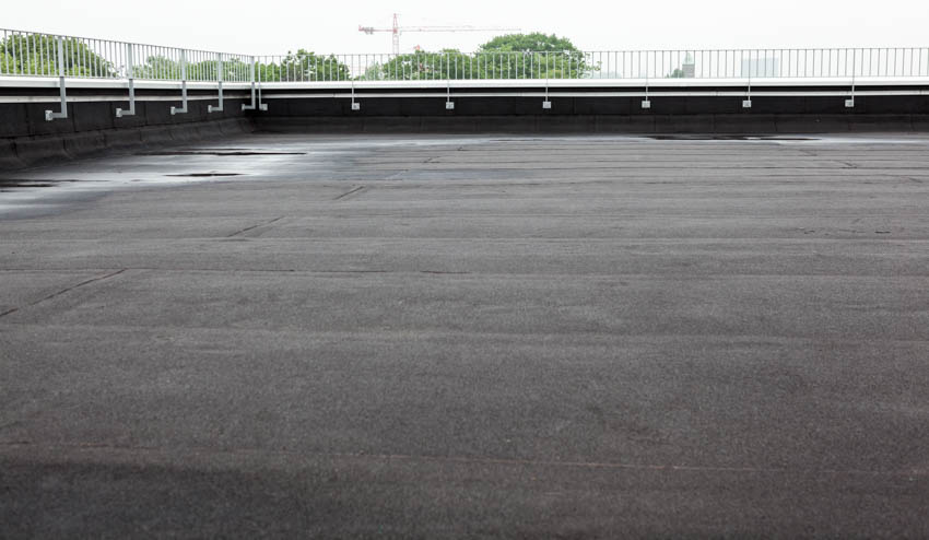 Flat roof with peel and stick roofing