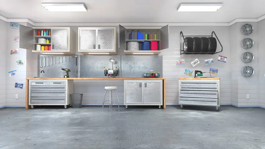 Garage man cave with concrete floor tools and workspace