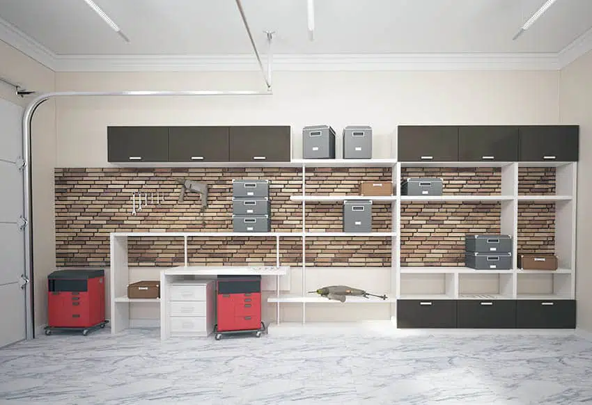 Garage with brick accent wall and shelving