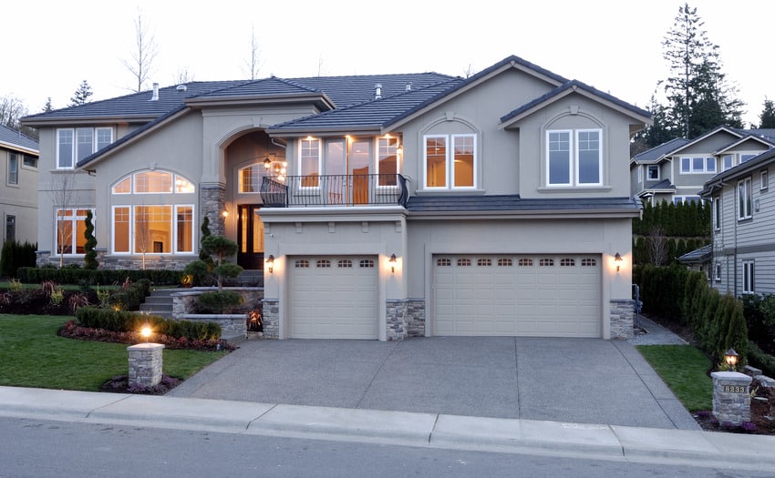 House with driveway pillar lights