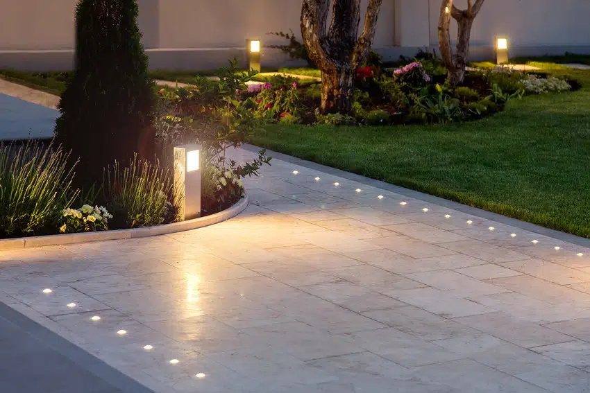 House with built in ground driveway lights