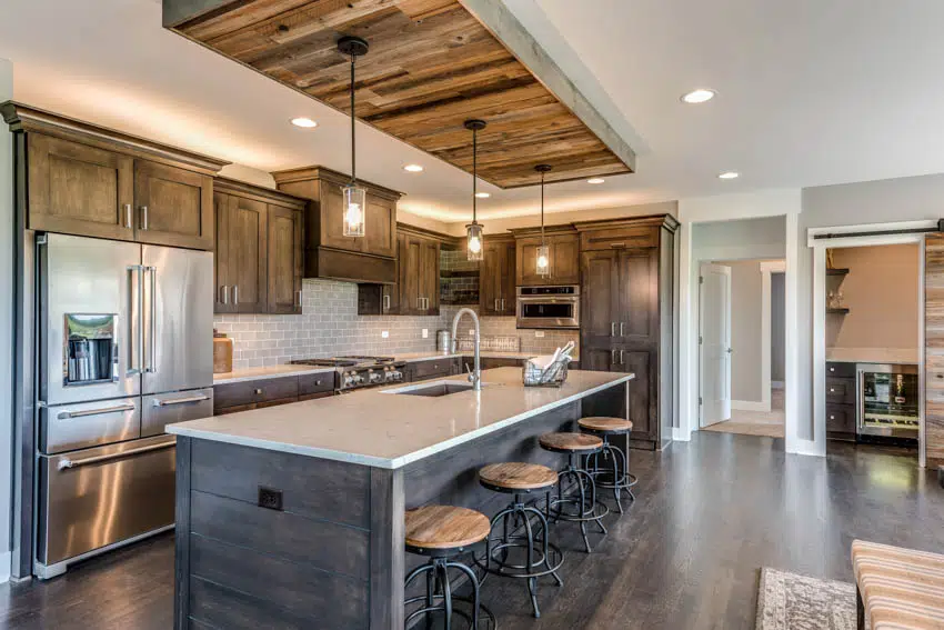 Kitchen with wood accents and custom island with seating