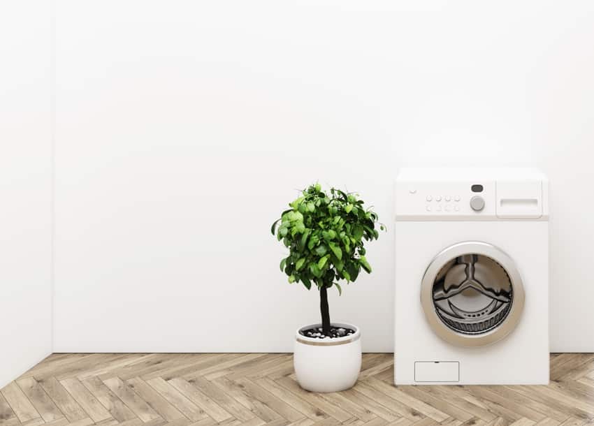 laundry room with engineered wood floors