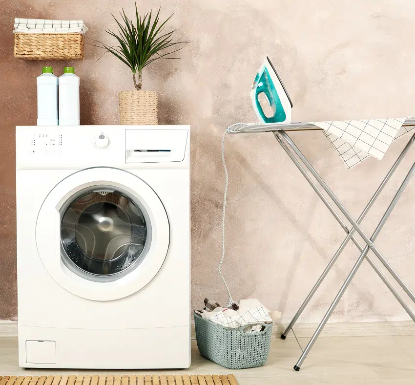 laundry room with washing machine iron hamper basket ironing body and supplies