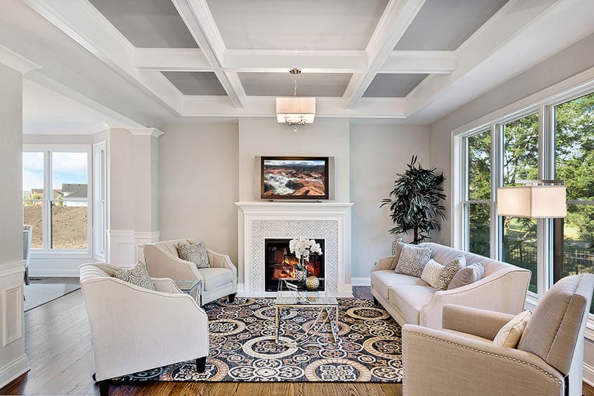 Living room with white coffered design ceiling feature with gray paint