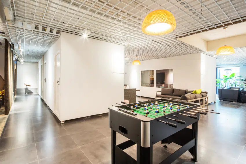 Man cave white foose ball table and tile floor