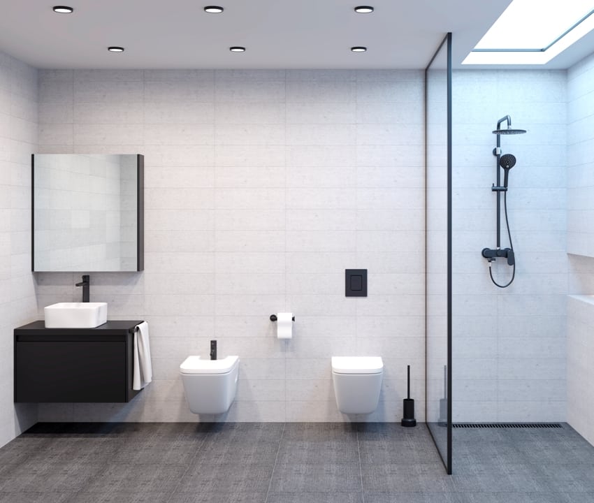 minimalist modern bright shower room with shower toilet bidet and washbasin with mirror