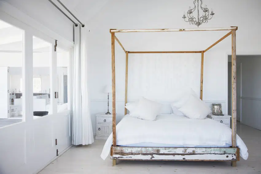 Modern bedroom interior with stylish four poster bed