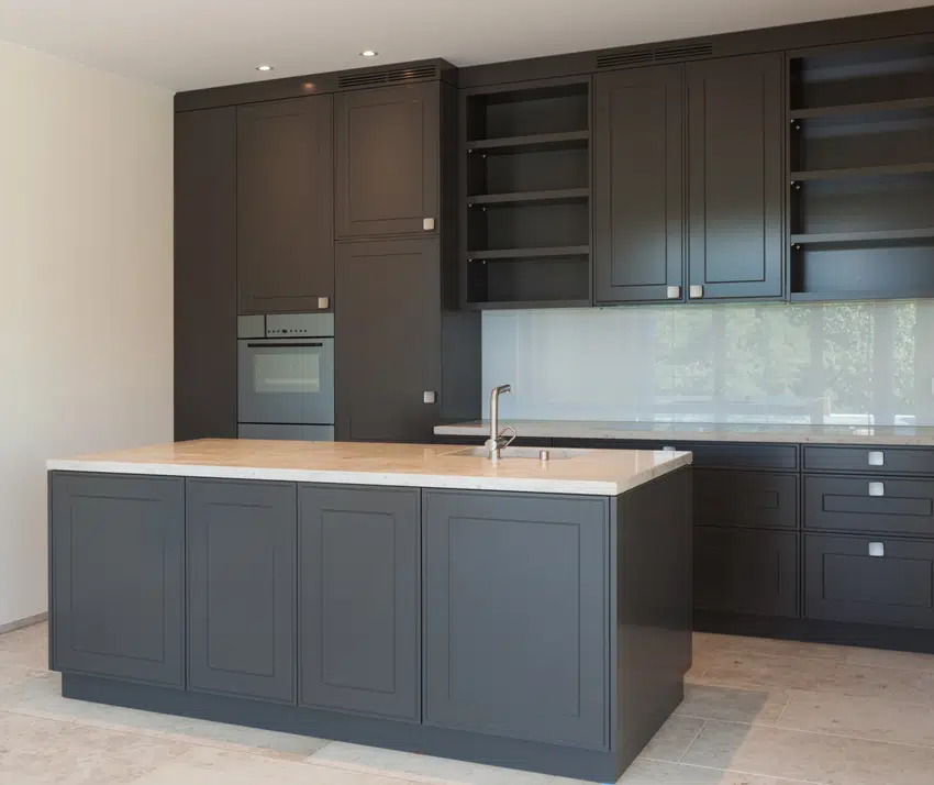 Modern kitchen with black cabinets and center island