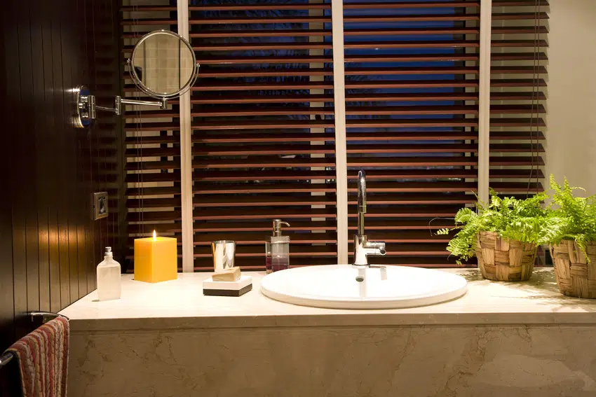 Modern porcelain sink with wooden blinds