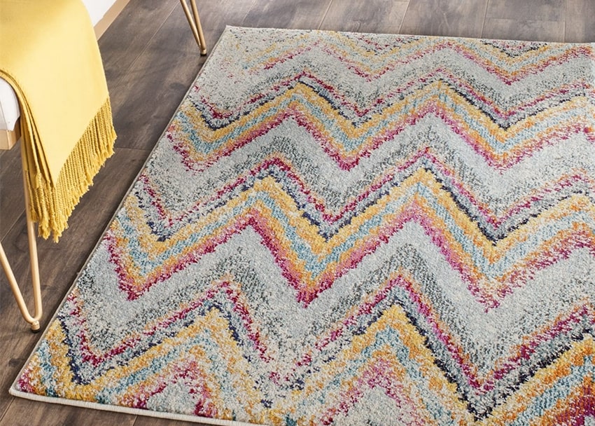 Multicolored distressed chevron rug