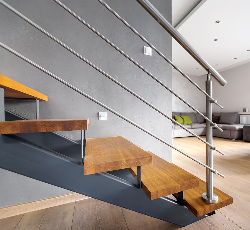 open living room with furniture and wooden staircase