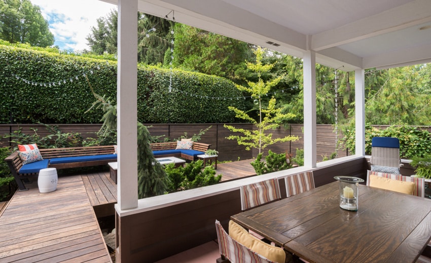 Outdoor deck with wood table and sofa