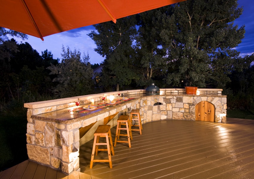 Outdoor dining area with counter lighting